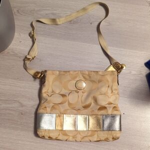 Gold Coach Purse.